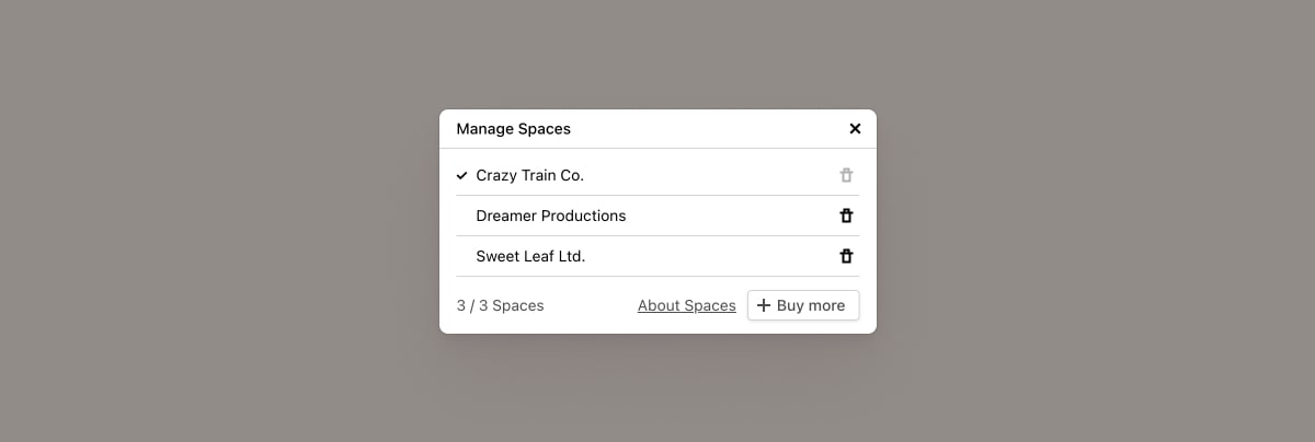 Cakedesk spaces management dialog showing multiple company workspaces